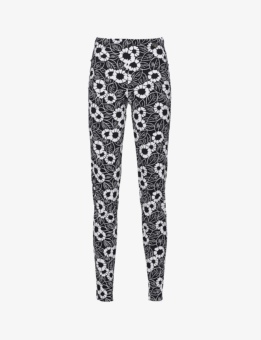 PRADA Floral-print skinny mid-rise stretch-recycled nylon trousers